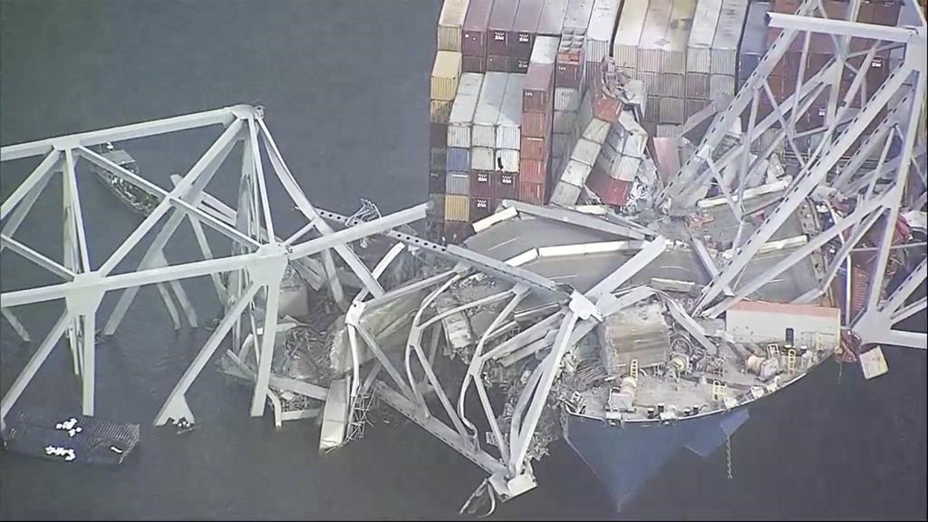 Six presumed dead in Baltimore bridge collapse after powerless cargo ship rams into support column
