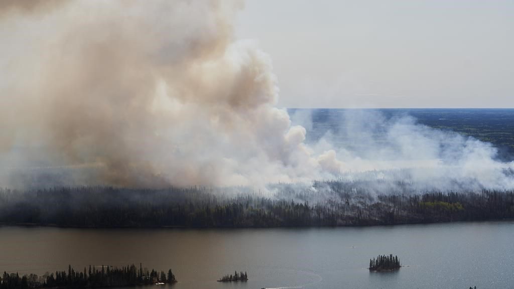 7 homes, cottages destroyed by out-of-control wildfire near Flin Flon: officials