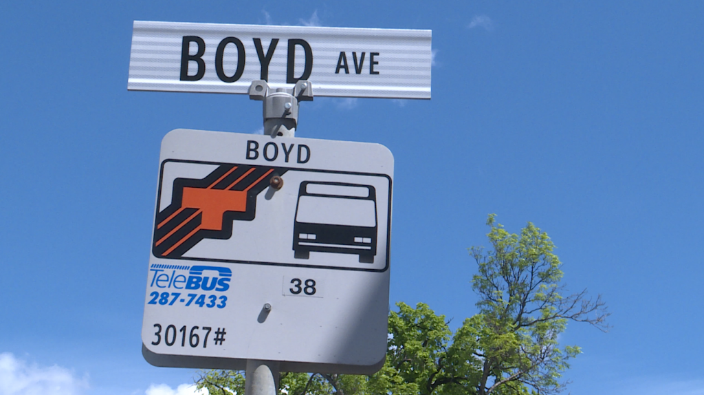 street sign for Boyd avenue and bus stop