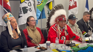 Chief Emeritus Raymond Flett speaks