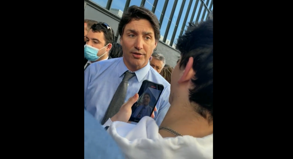 Prime Minister Justin Trudeau speaks with a student in Manitoba during an interaction that has since gone viral