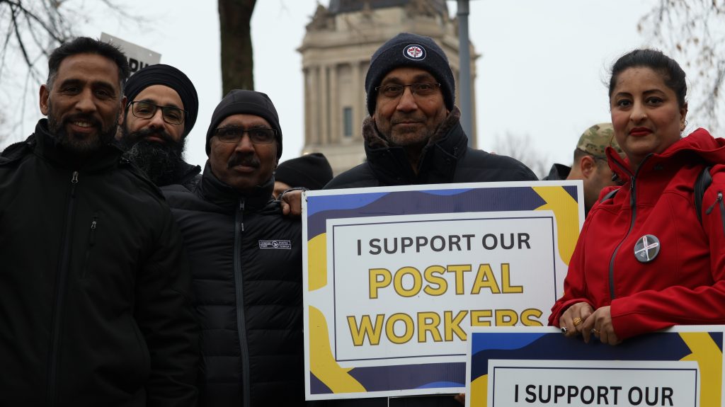 Winnipeg postal workers unite in march for new contracts